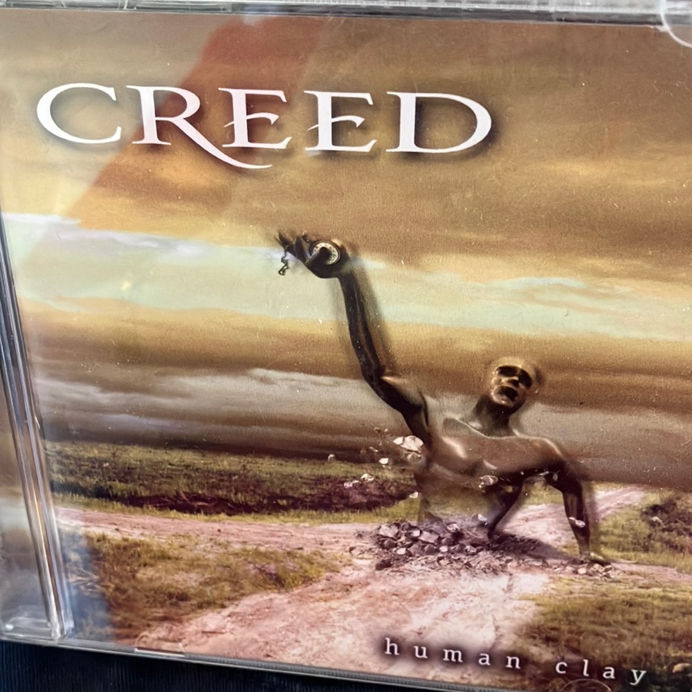 Creed human clay cd